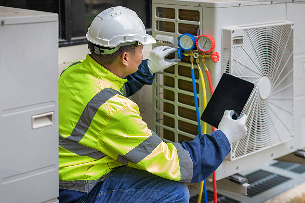 Professional Air Duct Cleaning technician working in Frederick, MD